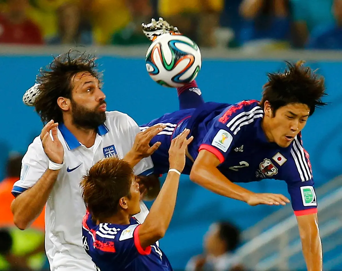 2014-06-20T001719Z-878543699-GF2EA6K00EG01-RTRMADP-3-SOCCER-WORLD-M22-JPN-GRE-JPG8253268481395360232