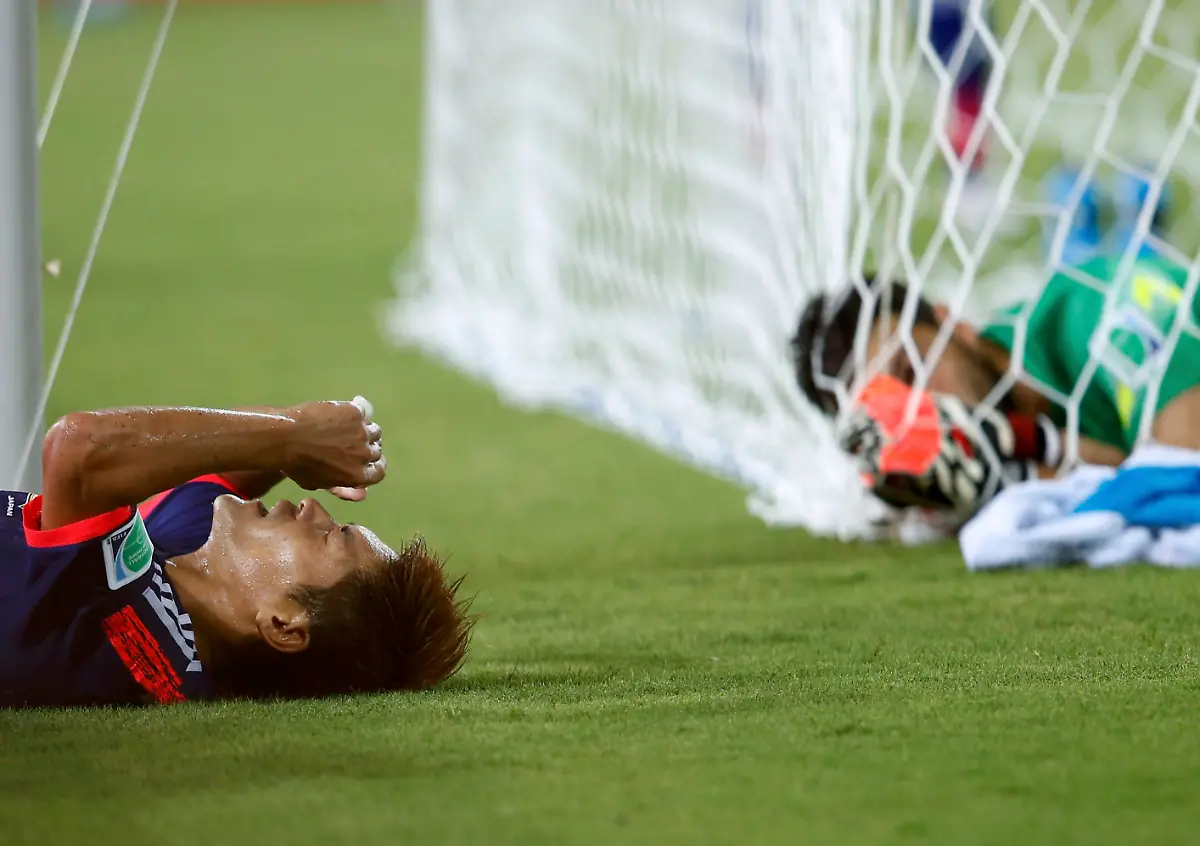 2014-06-20T002100Z-354755476-GF2EA6K00FP01-RTRMADP-3-SOCCER-WORLD-M22-JPN-GRE-JPG1322751266157511765