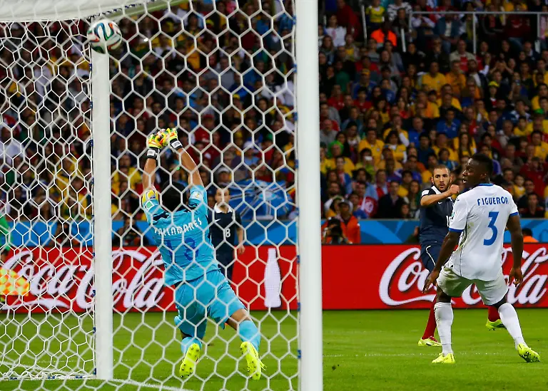 2014-06-15T205931Z-788527952-TB3EA6F1OYBTJ-RTRMADP-3-SOCCER-WORLD-M10-FRA-HON-JPG7966886596992527463