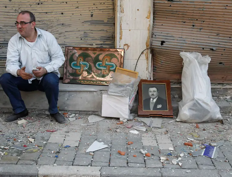 2014-05-09T160900Z-844979764-GM1EA591U4001-RTRMADP-3-SYRIA-CRISIS-HOMS-JPG6825560040658743810