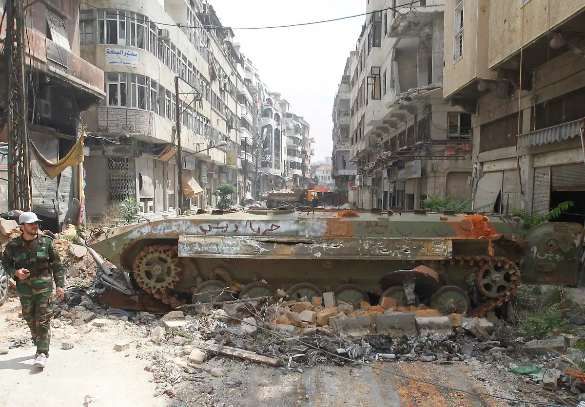 2014-05-09T154136Z-119181584-GM1EA591TNZ01-RTRMADP-3-SYRIA-CRISIS-HOMS-JPG488982292612051702