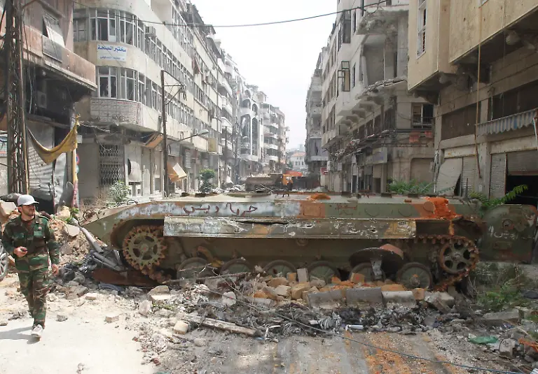 2014-05-09T154136Z-119181584-GM1EA591TNZ01-RTRMADP-3-SYRIA-CRISIS-HOMS-JPG488982292612051702