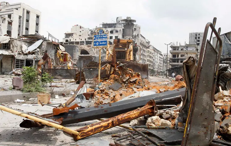 2014-05-09T141952Z-335350261-GM1EA591PU201-RTRMADP-3-SYRIA-CRISIS-HOMS-JPG2152128993806318231