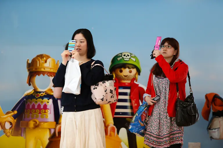 Tourists-take-photos-at-the-Playmobil-FunPark