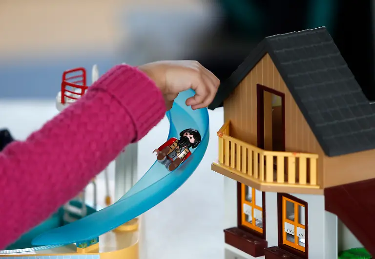 A-child-plays-with-a-Playmobil-figure-at-the-Playmobil-FunPark