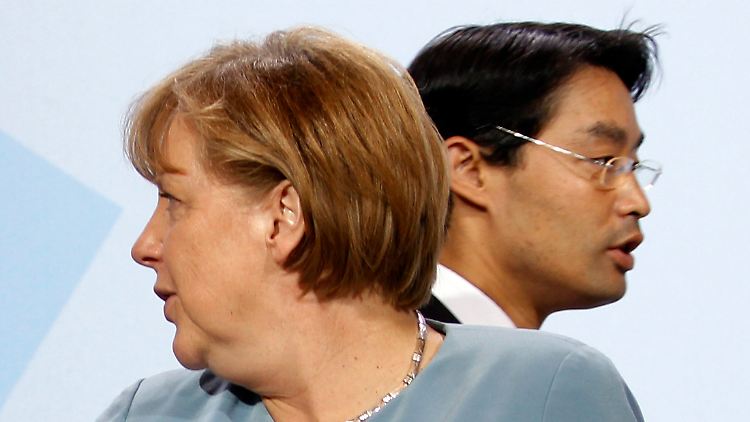 CDU-Chefin Angela Merkel und FDP-Chef Philipp Rösler verwirren zurzeit oft auch die eigenen Anhänger.