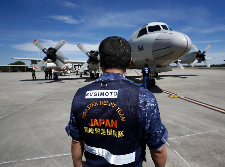 2014-03-24T064441Z-751583534-GM1EA3O14U401-RTRMADP-3-MALAYSIA-AIRLINES-JPG6911101750039966129