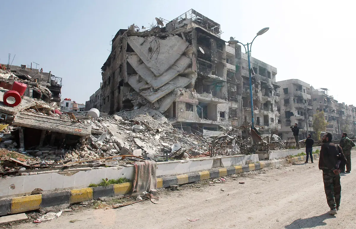 2014-03-14T081826Z-721955126-GM1EA3E195K01-RTRMADP-3-SYRIA-CRISIS-TRUCE-JPG4741294596409038469