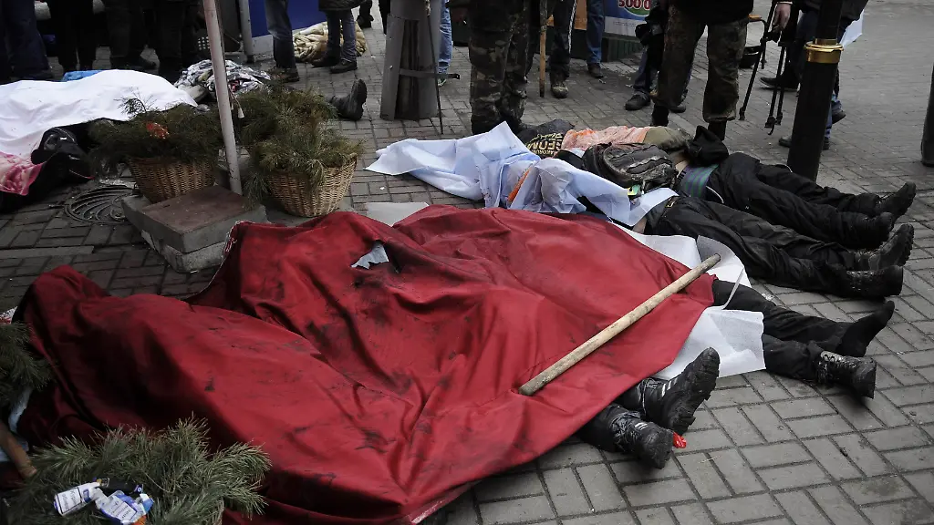 2014-02-20T113457Z-494834689-GM1EA2K1I9O01-RTRMADP-3-UKRAINE-JPG3509209461571934206