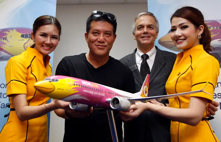 2014-02-12T060404Z-993376728-GM1EA2C130T01-RTRMADP-3-AIRSHOW-SINGAPORE-NOKAIR-JPG6420385939903841003