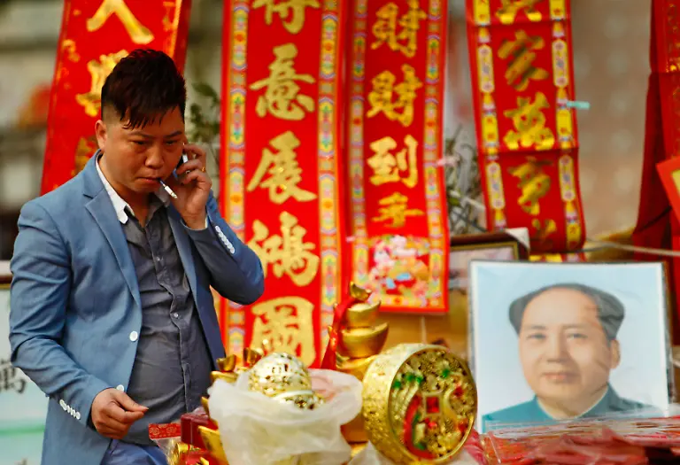 2014-01-28T092632Z-2086459989-GM1EA1S1CC501-RTRMADP-3-CHINA-JPG7065115412878258959