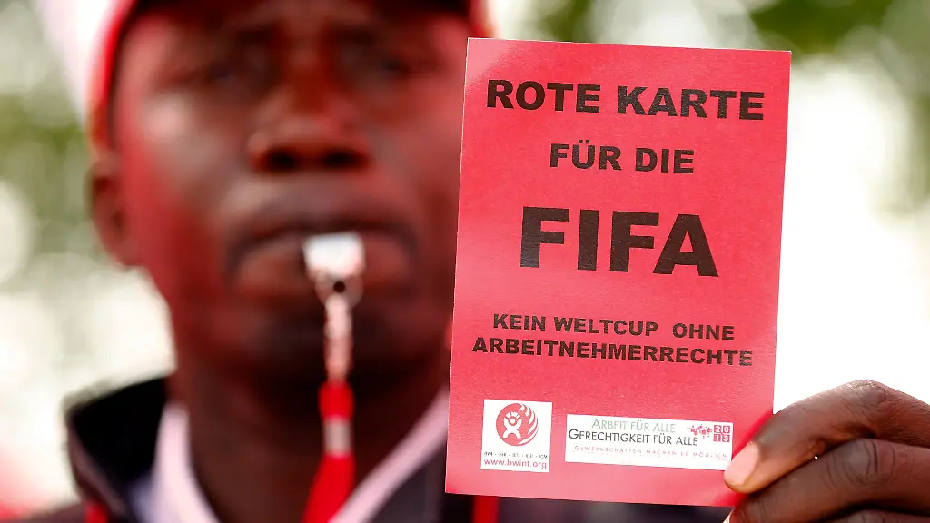 2013-10-03T125629Z-1518537-GM1E9A31M2E01-RTRMADP-3-SWITZERLAND-FIFA-PROTEST-JPG1570930376246440622