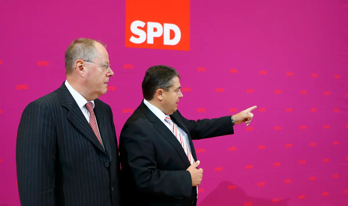 2013-09-23T092532Z-142422759-LR1E99N0Q69PQ-RTRMADP-3-GERMANY-ELECTION-JPG2812175607312698306