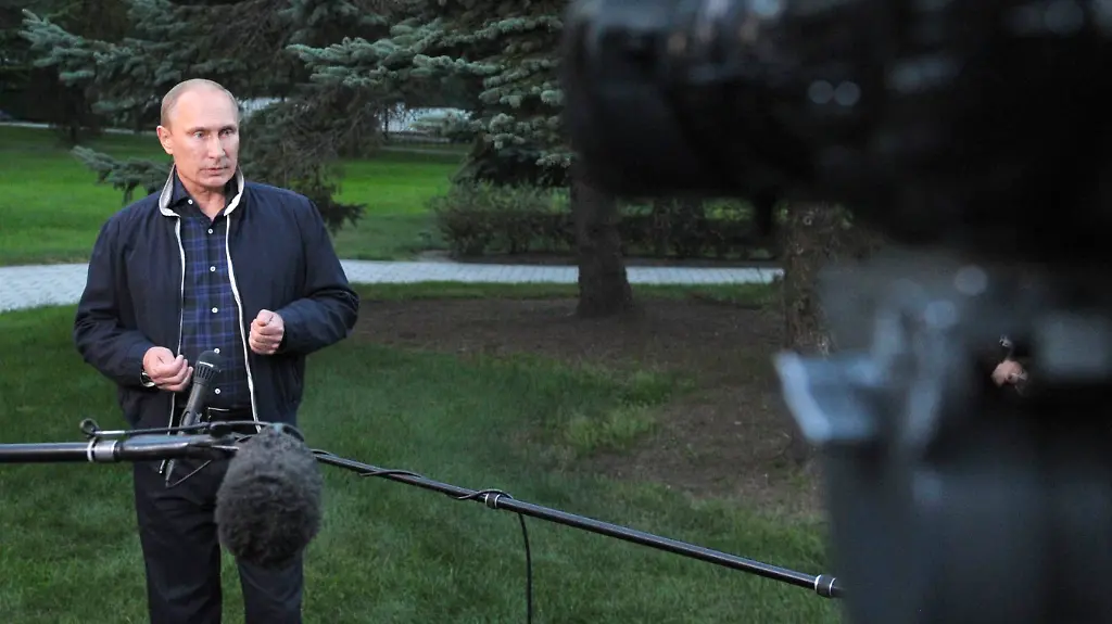 2013-08-31T110416Z-682049840-GM1E98V1GW902-RTRMADP-3-SYRIA-CRISIS-PUTIN-JPG5454279977298660646