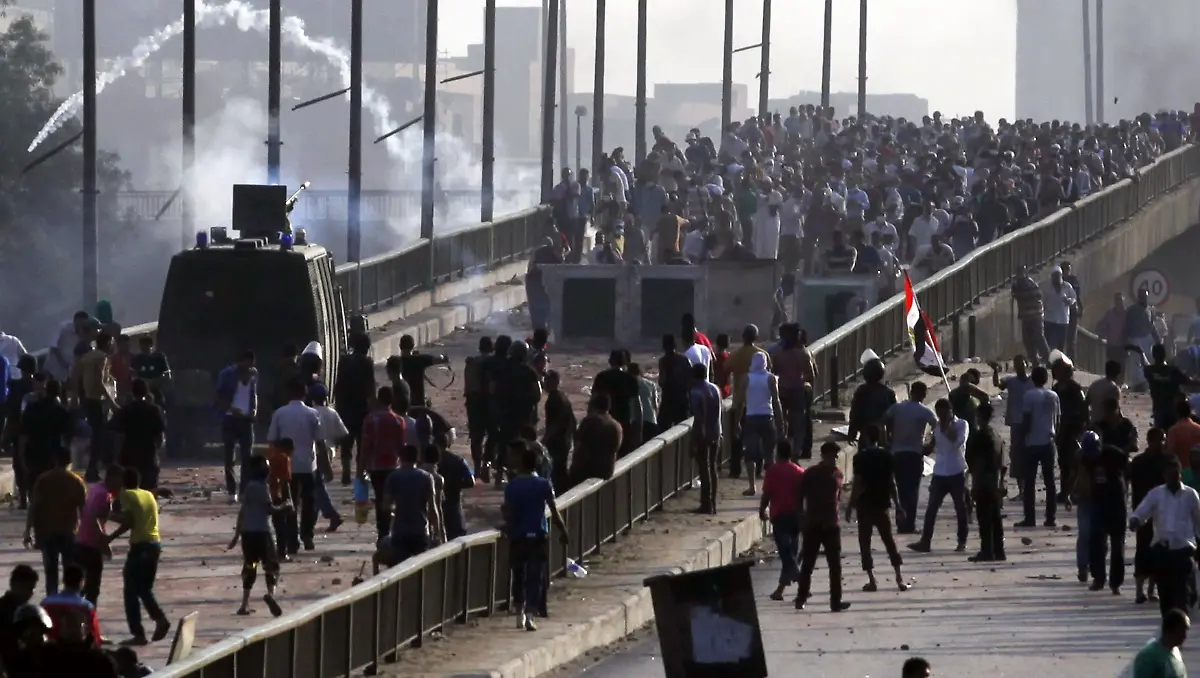 2013-08-14T163042Z-495630141-GM1E98F01CZ01-RTRMADP-3-EGYPT-PROTESTS-JPG3869720035777556975