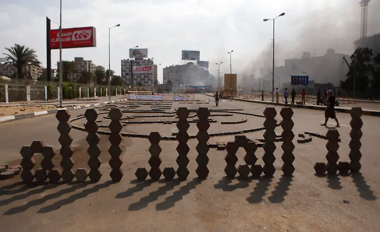 2013-08-14T151924Z-348570173-GM1E98E1MDN01-RTRMADP-3-EGYPT-PROTESTS-JPG8471610246653220595