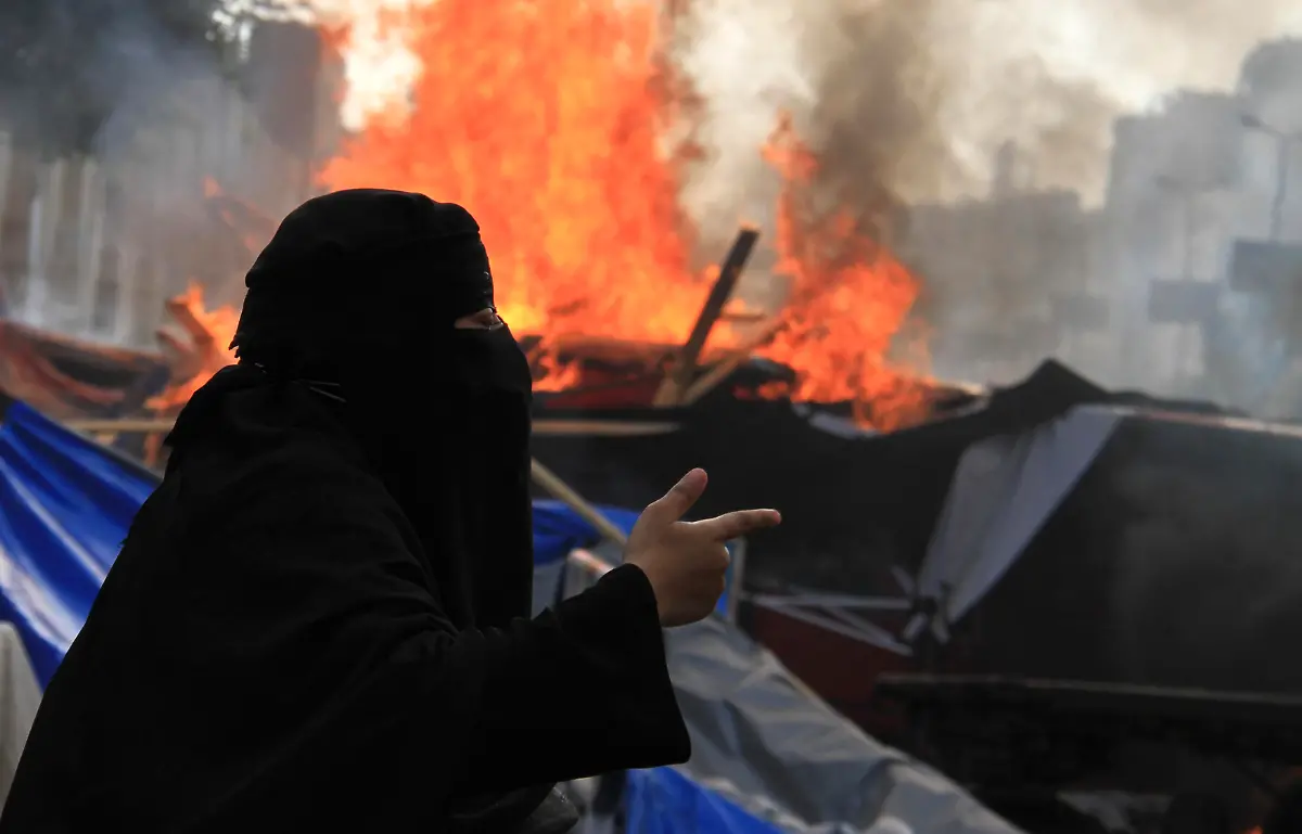 2013-08-14T113058Z-1941341749-GM1E98E1I2U01-RTRMADP-3-EGYPT-PROTESTS-JPG340227644637510061