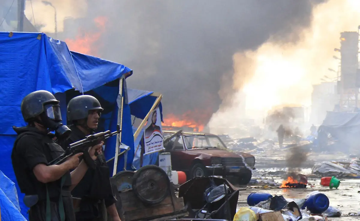 2013-08-14T112611Z-1746852715-GM1E98E1HWE01-RTRMADP-3-EGYPT-PROTESTS-JPG518337624302405258