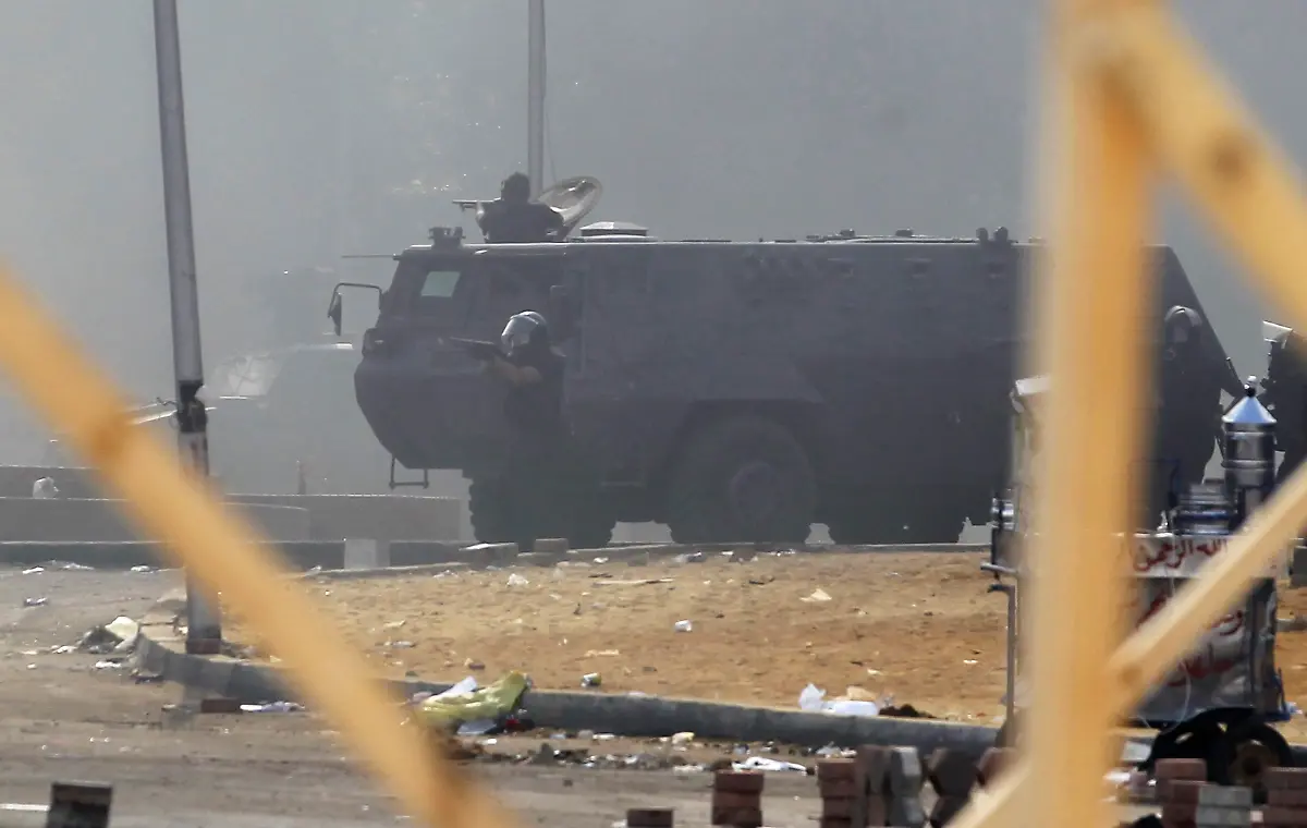 2013-08-14T101753Z-1366106865-GM1E98E1EL601-RTRMADP-3-EGYPT-PROTESTS-JPG6922953912248417494