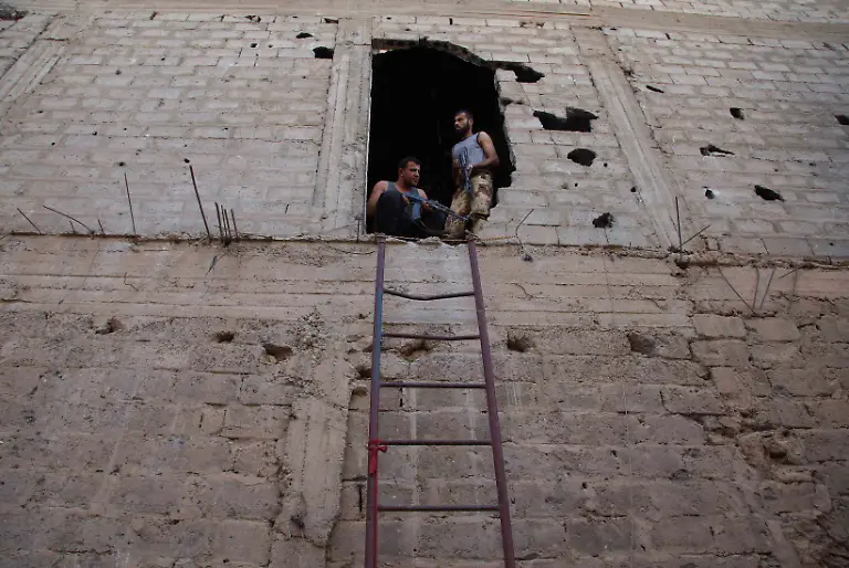 2013-07-11T104959Z-1648382557-GM1E97B1FJJ01-RTRMADP-3-SYRIA-CRISIS-JPG6520081750747857465