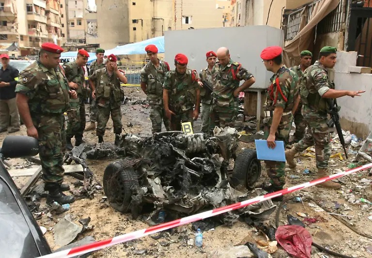 2013-07-09T122921Z-56907866-GM1E9791KTG01-RTRMADP-3-LEBANON-EXPLOSION-JPG56971204801496733