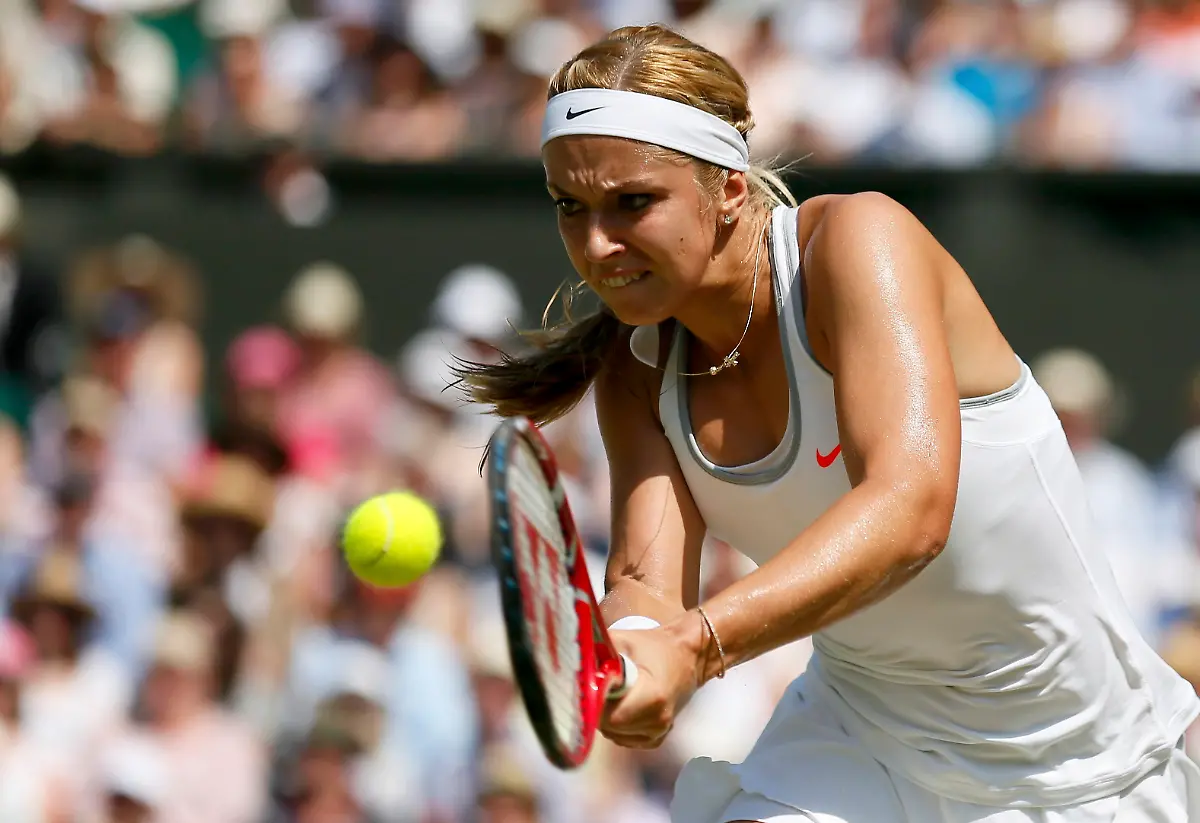 2013-07-06T141244Z-428659917-LR2E97613GYJ3-RTRMADP-3-TENNIS-WIMBLEDON-JPG8388034170290177220