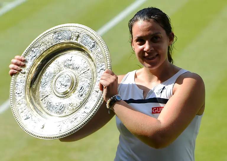 2013-07-06T153043Z-306842223-LR2E976172WMT-RTRMADP-3-TENNIS-WIMBLEDON-JPG8094125648744358832