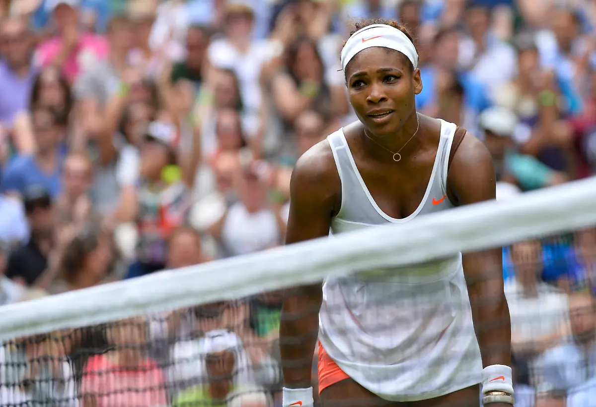 2013-07-01T150355Z-1815412846-LR2E97115U8IM-RTRMADP-3-TENNIS-WIMBLEDON-JPG31456174167201481