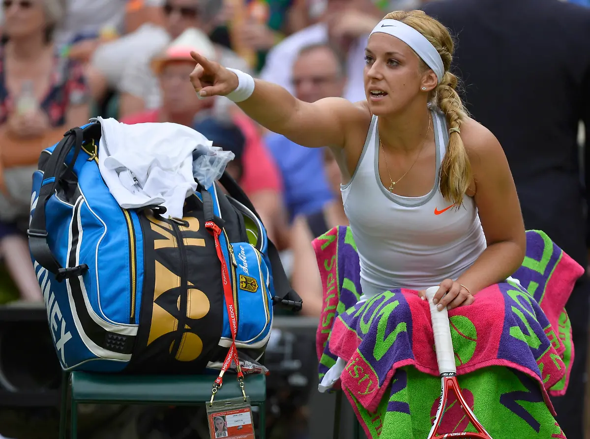 2013-07-01T132356Z-732676265-LR2E971117MDS-RTRMADP-3-TENNIS-WIMBLEDON-JPG976291478575010589