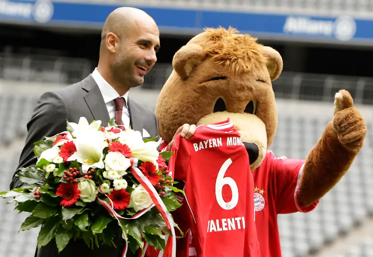 2013-06-24T124213Z-1043624469-BM2E96O14P701-RTRMADP-3-SOCCER-BAYERN-GUARDIOLA-JPG6658836800193878666