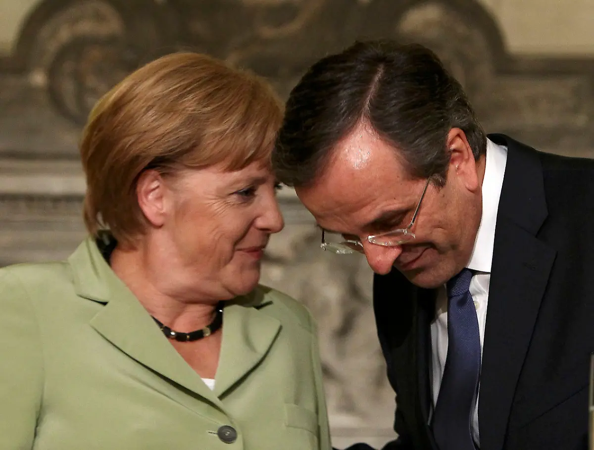 2012-10-09T141836Z-01-JMR30-RTRMDNP-3-GREECE-MERKEL-JPG4531165800226576072