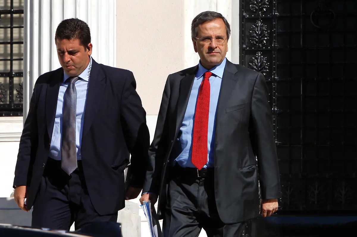 2012-09-20T135901Z-01-KAR10-RTRMDNP-3-GREECE-AUSTERITY-TROIKA-JPG6084383846953588423