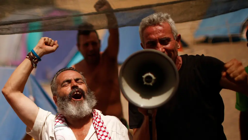 2012-08-09T132648Z-01-JN2093-RTRMDNP-3-SPAIN-PROTEST-JPG6526745229682771552