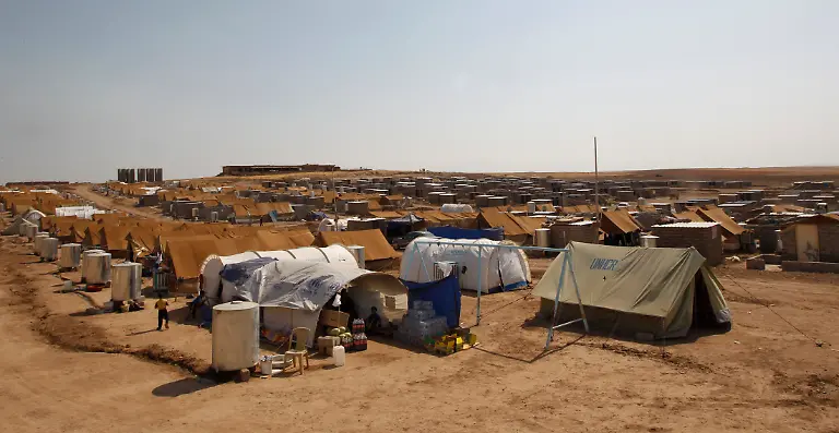 2012-07-27T094152Z-01-BAG08-RTRMDNP-3-SYRIA-CRISIS-IRAQ-JPG8302484213896674524