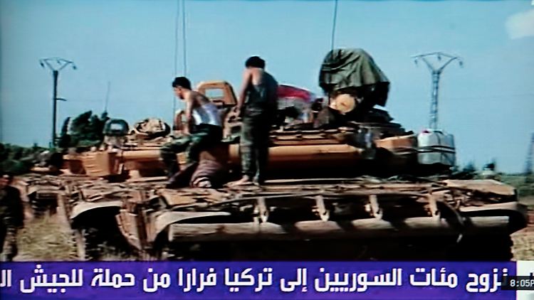 Die vom TV-Sender Arabija verbreitete Aufnahme zeigt syrische Soldaten und Panzer bei einem Dorf im Norden.