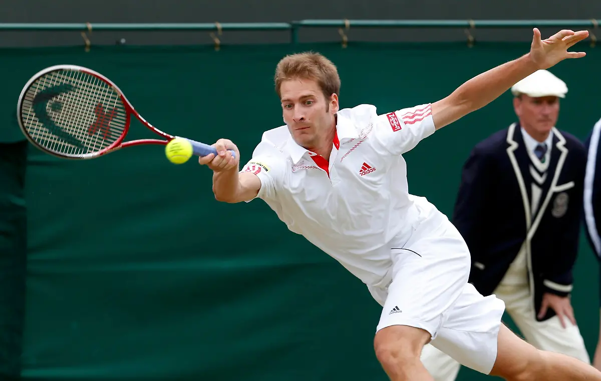 2012-07-03T114557Z-01-WIM018-RTRMDNP-3-TENNIS-WIMBLEDON-JPG6713681930282836185