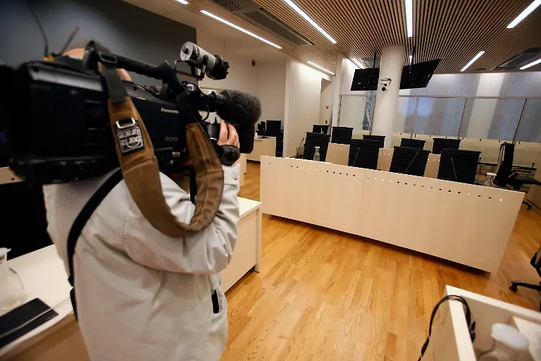 2012-04-13T130138Z-01-STN114-RTRMDNP-3-NORWAY-ATTACKS-JPG315753582365456234