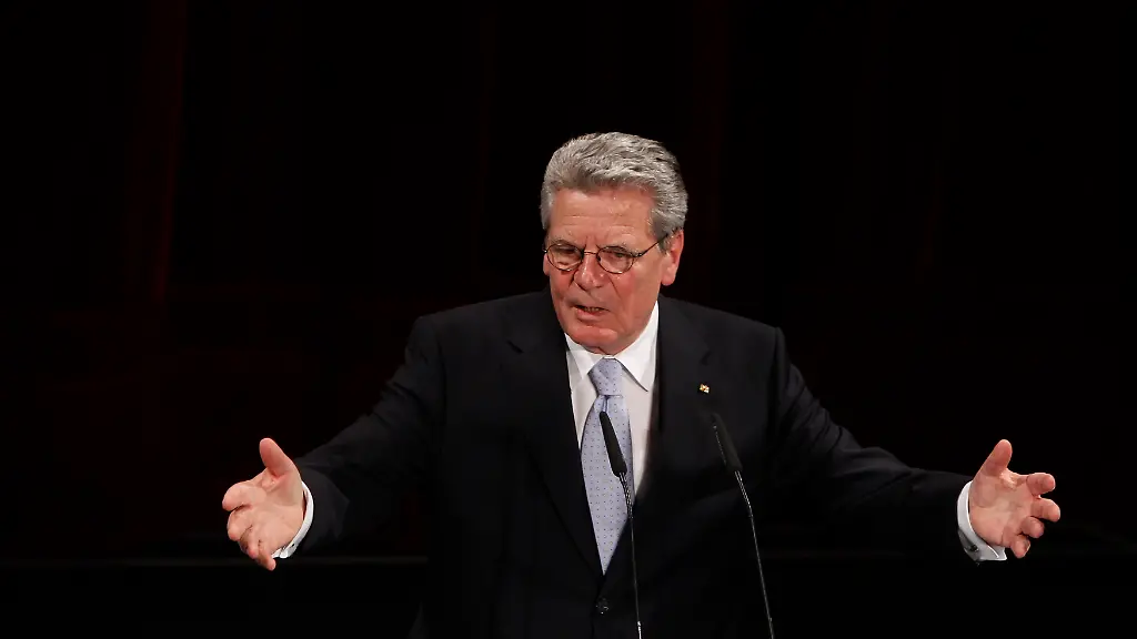 2012-03-15T161946Z-01-BER02-RTRMDNP-3-GERMANY-PRESIDENT-MERKEL-JPG319937102461718275