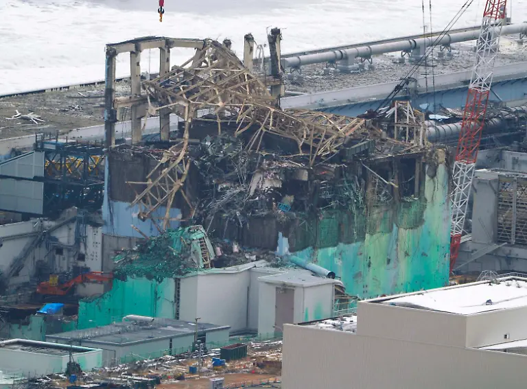 2012-03-11T073648Z-01-SIN905-RTRMDNP-3-JAPAN-TSUNAMI-JPG5426512825914123379