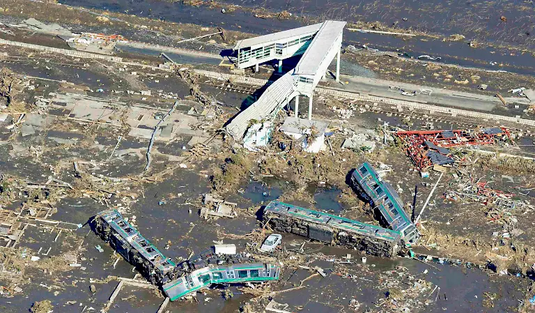 2012-03-07T112853Z-01-TOK113-RTRMDNP-3-JAPAN-TSUNAMI-1