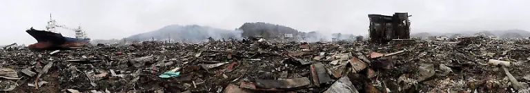 2012-03-07T103022Z-01-TOK002-RTRMDNP-3-JAPAN-TSUNAMI-1