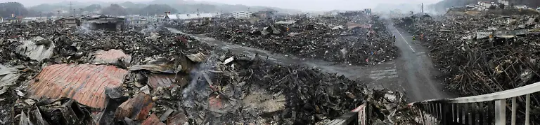 2012-03-07T102516Z-01-TOK103-RTRMDNP-3-JAPAN-TSUNAMI-1