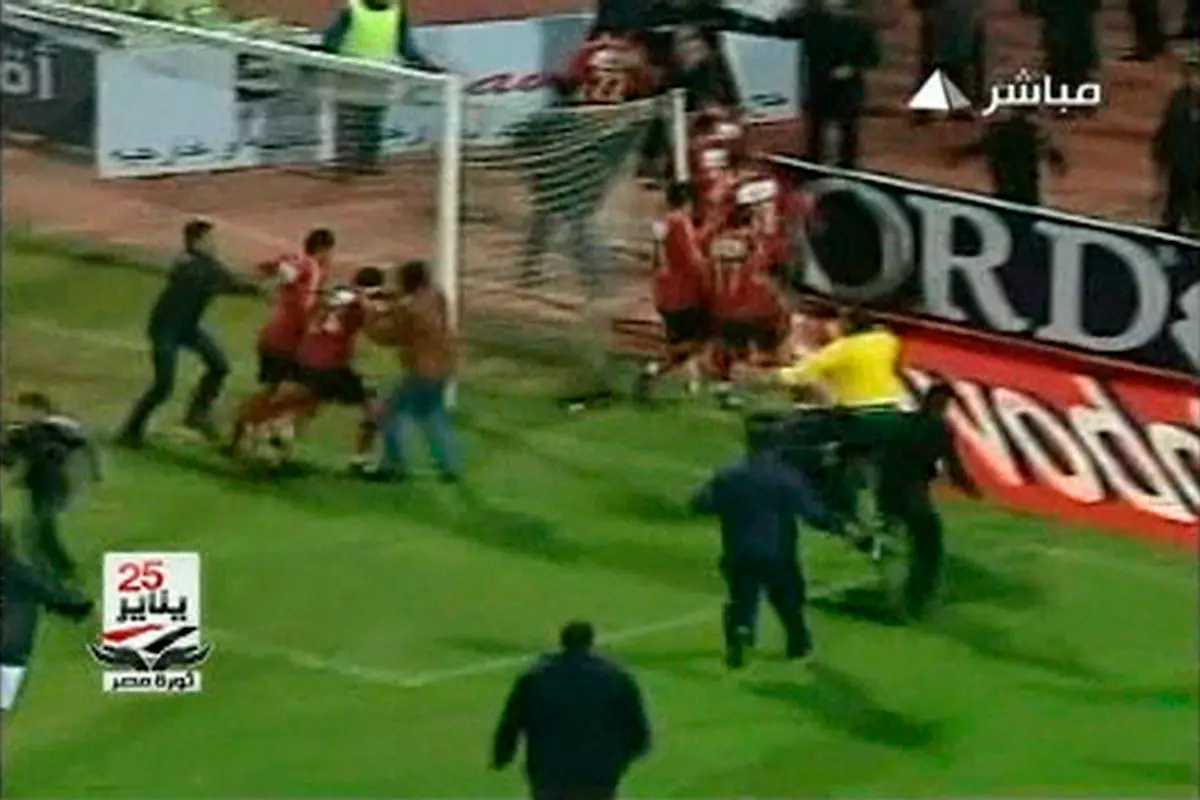 2012-02-01T202339Z-01-SIN703-RTRMDNP-3-EGYPT-SOCCER-VIOLENCE-JPG4644185354386889416