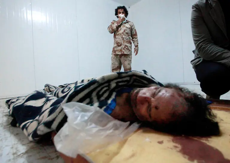 2011-10-22T170803Z-01-SJS05-RTRMDNP-3-LIBYA-MISRATA-RIVALY-JPG5990164390057438749