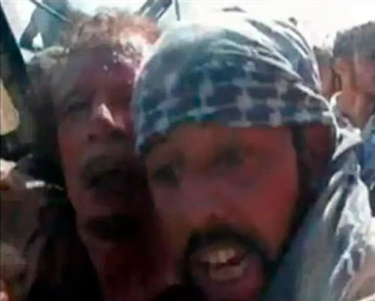 2011-10-20T191823Z-01-LON51R-RTRMDNP-3-LIBYA-JPG3264521622438345346