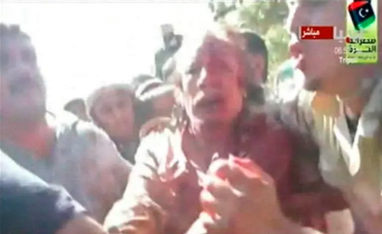 2011-10-20T191927Z-01-LON55R-RTRMDNP-3-LIBYA-JPG3710820523561068390