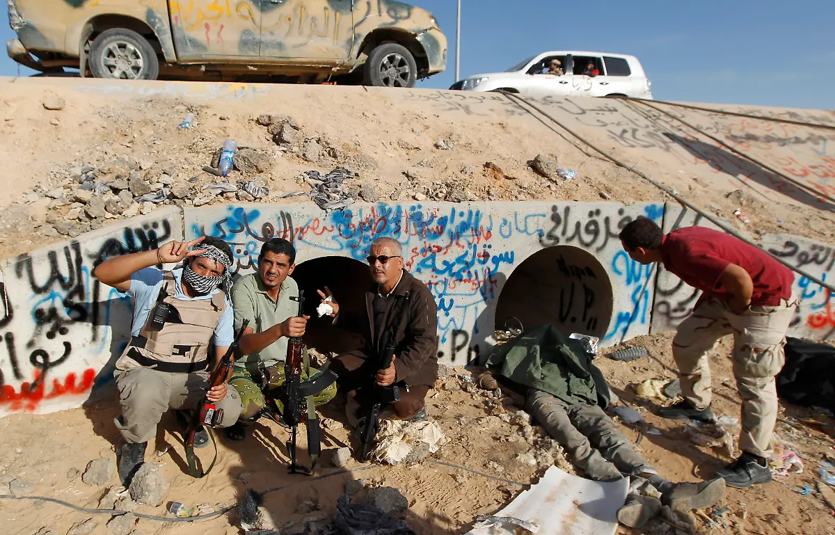 2011-10-20T223120Z-01-LIB05-RTRMDNP-3-LIBYA-JPG660687199144506294