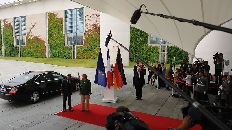 Geballte Aufmerksamkeit: Kanzlerin Merkel und Präsident Sarkozy konnten sich offenbar einigen. 