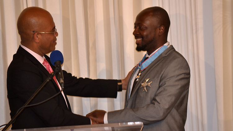 Haitis Präsident und Sänger Michel Martelly (li.) und Hip-Hopper Wyclef Jean sind befreundet.