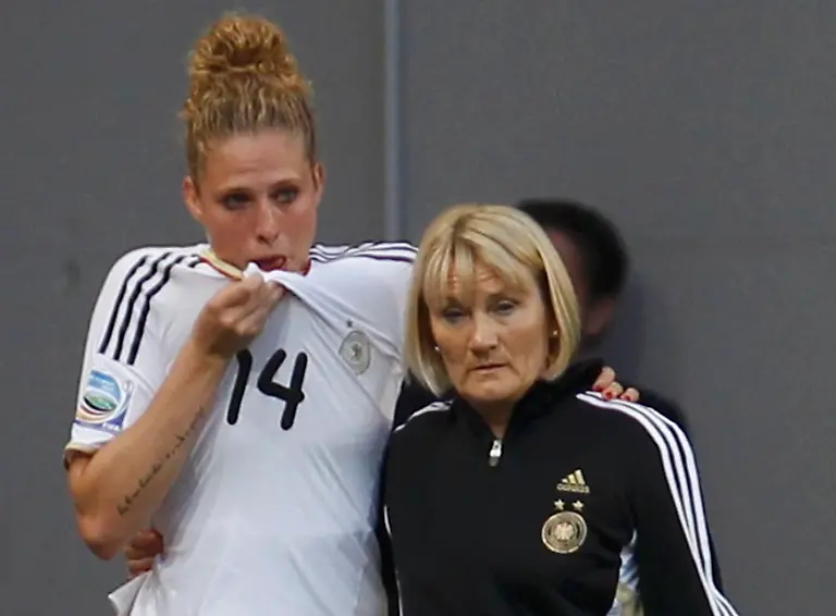 2011-07-09T190711Z-01-MDA38-RTRMDNP-3-SOCCER-WOMAN-WORLD-JPG3104633080959453137